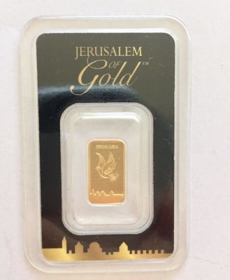 מטיל זהב טהור 999.9 במשקל של 1 גרם חתום וממוספר 06826 במהדורה מוגבלת. 
דגם ירושלים של זהב. של 