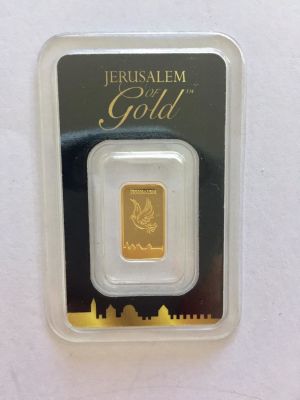 מטיל זהב טהור 999.9 במשקל של 1 גרם חתום וממוספר 06824 במהדורה מוגבלת. 
דגם ירושלים של זהב. של 