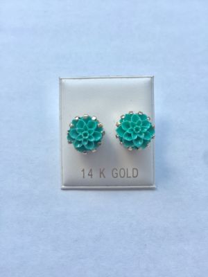 זוג עגילי זהב לבן 14K. דגם פרח טורקיז. 
סוגר סיליקון נצמד לאוזן. הפריט לא נמכר עפ"י משקל.