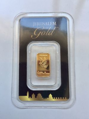 מטיל זהב טהור 999.9 באריזה מקורית. 1 גרם. 
מספר סידורי: 01223 
FINE GOLD BAR 
THE HOLY LAND 