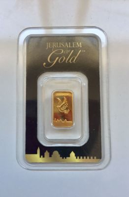 מטיל זהב טהור 999.9 באריזה מקורית. 1 גרם. 
מספר סידורי: 06752 
FINE GOLD BAR 
