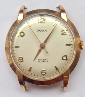 שעון זהב 14K יפה ומרשים לגבר של חברת דוקסה DOXA. 
מצב עבודה. קוטר 40 מ"מ. משקל כולל 27 גרם.