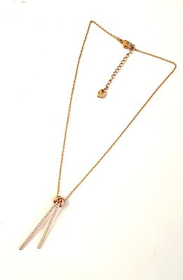 Подвеска &laquo;Золотой узел&raquo; от Swarovski Co. Материалы: позолота, кристаллы Swarovski 
Размеры: 