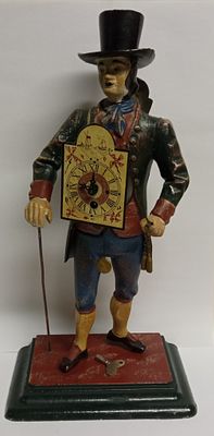 Часы Часовщик-продавец часов каминные Schwarzwald Германия 1900 гг. Материал: Шпиатр 
Страна: 