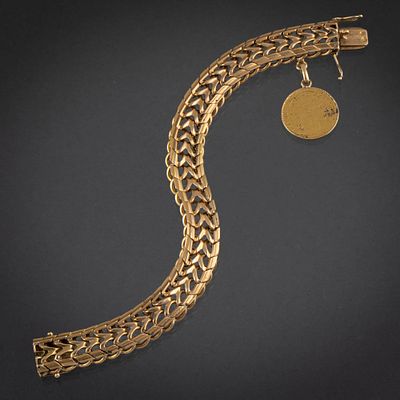 Pulsera ancha en oro amarillo de 18kt con moneda de 10 francos franceses como colgante. Measurem 