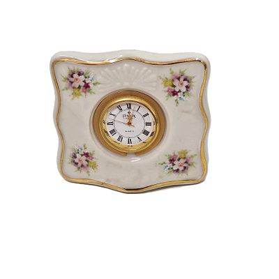 שעון שולחן וינטג'. שעון וינטג' לשולחן העבודה או ליד המיטה עשוי פורצלן. 
תוצרת אירלנד...ויוצר 