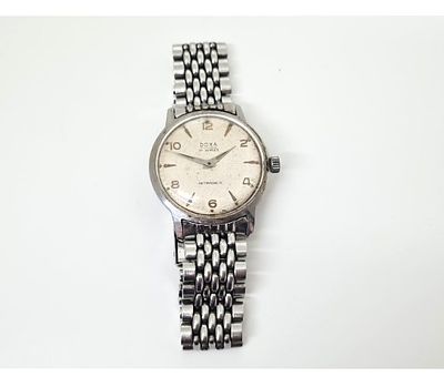 שעון DOXA שוויצרי. שעון וינטג' תוצרת שוויץ 
קוטר לוח - 3 ס"מ 
לא נבדקה תקינותו.