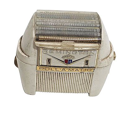 מכונת גילוח חשמלית וינטג' 
מדגם - REMINGTON ROLL-A-MATIC. המותג REMINGTON הוא מותג היסטורי הידוע 