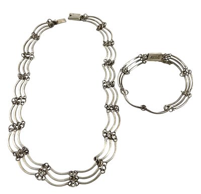 Серебряные ожерелье и браслет из ажурных звеньев. Серебро 925 пробы. Вес - ожерелье - 32,44 гр. 