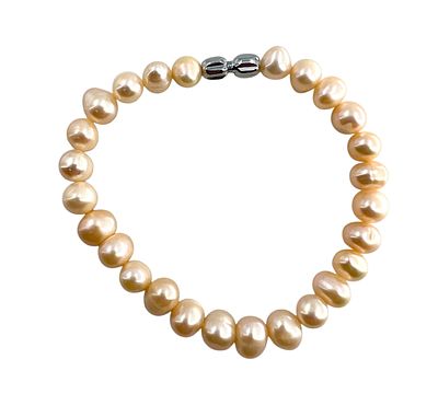 Браслет из натурального морского белого жемчуга. . Браслет. Вес 20,67 гр, диаметр бусин 0,9 см 