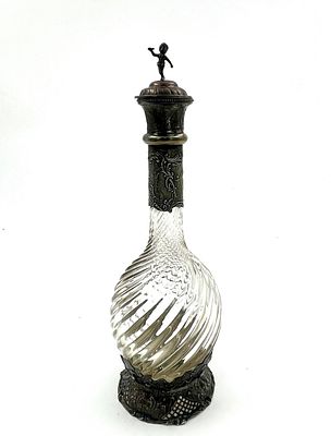 Водочный графин. Германия, XIX в. Серебро с патиной 800 пр. Фигурное толстостенное стекло. В 