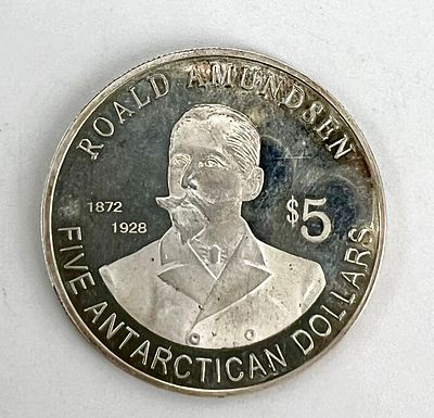 5 антарктических долларов с портретом Р. Амундсена.