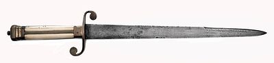 A Royal Navy Officers Dirk. A narrow blade with wedge-shaped cross-section and a false edge near 