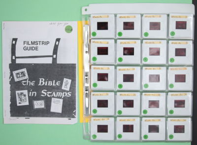 התנ"ך בבולים - פולדר של שקופיות בנושא תנ"ך + קטלוג (כריכה לא מקורית, דף צילום מכונה) בשפה 