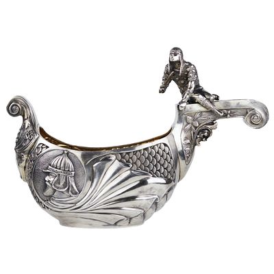 SILVER LADLE IN THE FORM OF A SLAVIC BOAT WITH A WARRIOR FIGURE SAZIKOV, MOSCOW, 1891. A rare 