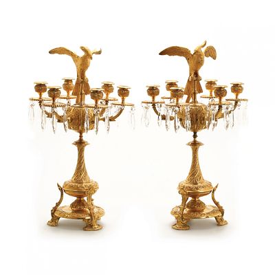 Pair of candelabra with figures of birds of paradise. A pair of candelabra decorated with 