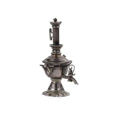 Miniature silver samovar. Early 20th century. Miniature silver samovar is an example of Russian 