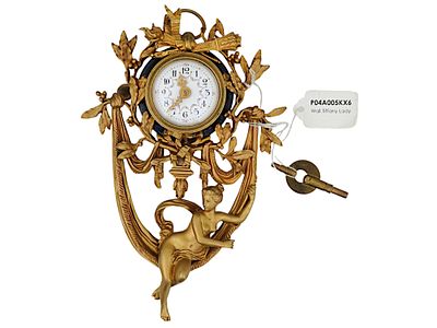TIFFANY LOUIS XV STYLE GILT BRONZE WALL CLOCK. An antique late 19th-century gilt bronze wall 