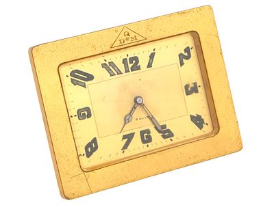 VINTAGE SWISS ART DECO GOLD TONE TRAVEL CLOCK. A vintage Swiss travel clock in the typical Art 
