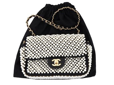 ORIGINAL CHANEL PEARL MINI FLAP HAND BAG 19S. An original Chanel Pearl Mini Flap Bag 19S. 