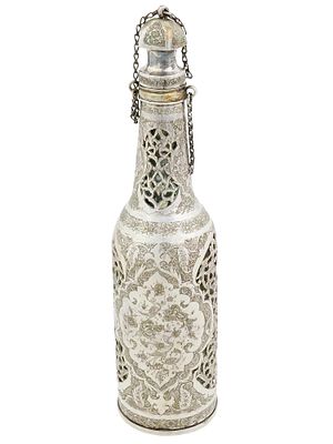 ANTIQUE PERSIAN ISFAHAN SILVER BOTTLE WITH GLASS BASE. An antique Persian Isfahan silver bottle. 
