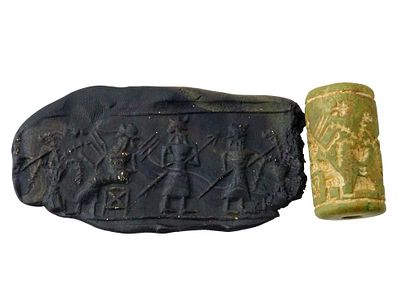 ANCIENT NEAR EASTERN CARVED STONE CYLINDER SEAL. An ancient Near Eastern manner carved stone 