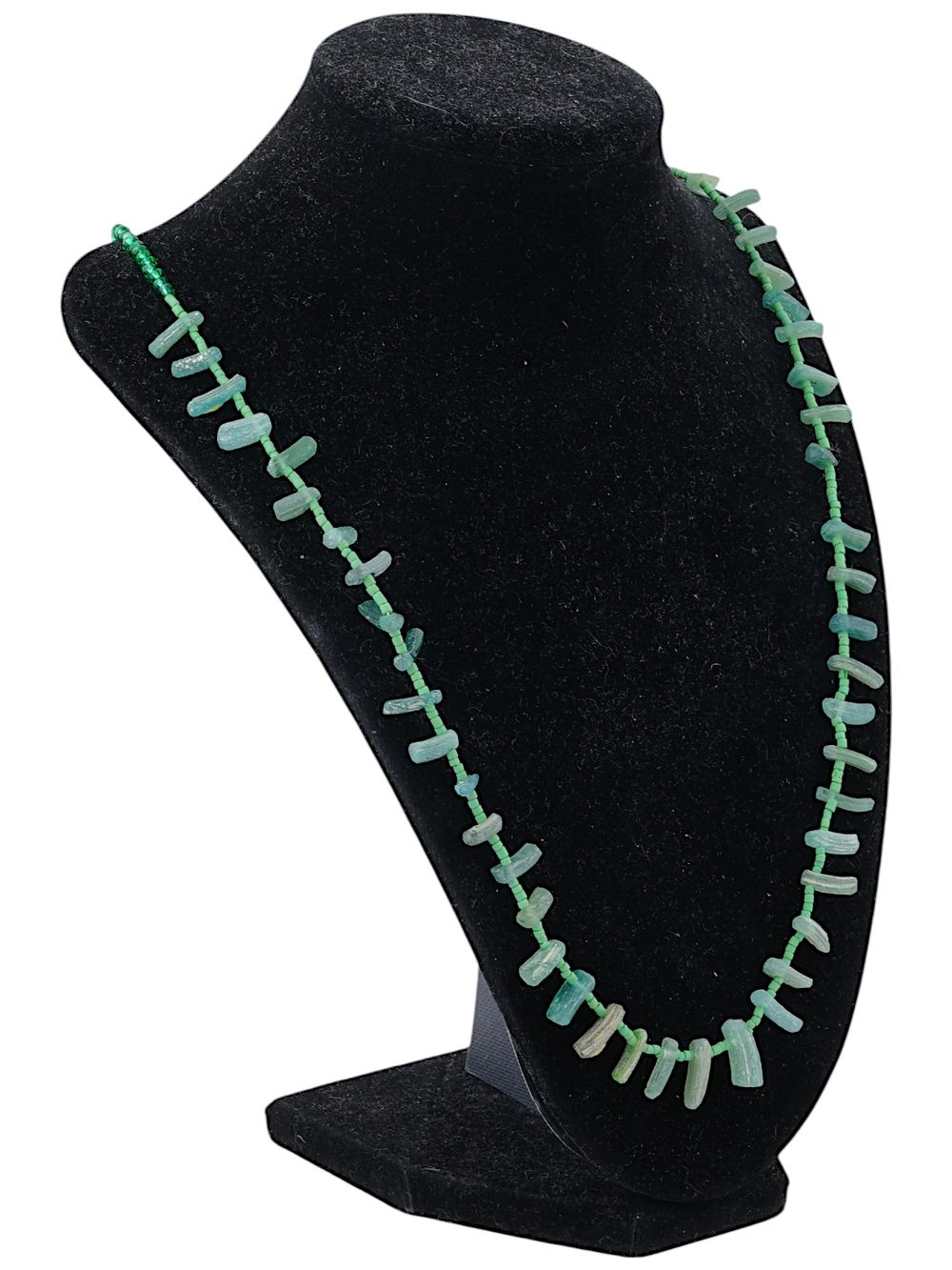 ANCIENT ROMAN GREEN GLASS BEAD NECKLACE. An ancient Roman glass bead necklace dating from 100 to 