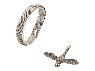 SILVER TIFFANY BRACELET W 18K GOLD SILVER BROOCH. A lot of two jewelry pieces feature a Tiffany