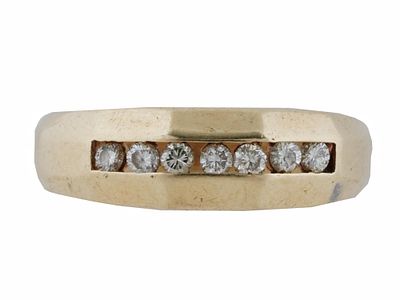 14K GOLD CRESCENT RING WITH SEVEN DIAMONDS. An elegant 14k gold crescent band ring with a row of