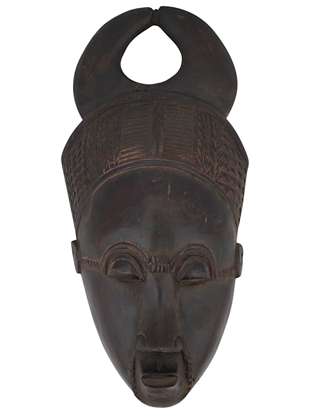 WEST AFRICAN BAULE PEOPLE WOOD MASK FROM IVORY COAST. A West African Baule people hand carved 