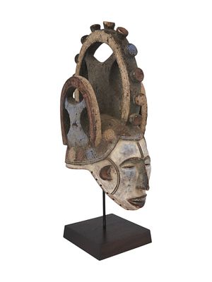 WEST AFRICAN NIGERIA IGBO PEOPLE WOODEN HELMET MASK. A West African, hand carved wooden Agbogho