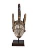 WEST AFRICAN NIGERIA IGBO PEOPLE WOODEN HELMET MASK. A West African, hand carved wooden Agbogho Image - 1