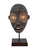 CENTRAL AFRICAN BAULE PEOPLE CARVED WOODEN MASK. A Central African Ivory Coast hand carved Image - 1