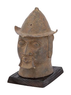 WEST AFRICAN NIGERIAN BENIN YORUBA BRONZE HEAD FIGURE. An Yoruba cast bronze warrior head figure