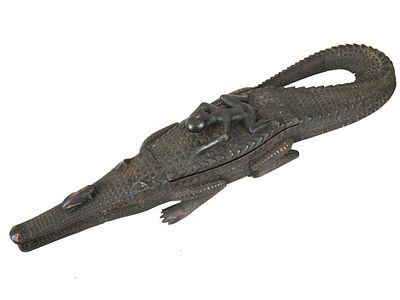 VINTAGE AFRICAN IVORY COAST WOODEN CROCODILE SCULPTURE. A vintage African Ivory Coast carved