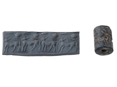 ANCIENT BLACK STEATITE CYLINDER SEAL BEAD. An ancient Sumerian hand carved black steatite
