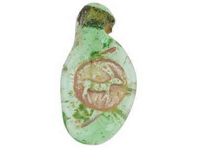 300 AD ROMAN ANIMAL GREEN GLASS MEDALLION PENDANT. An ancient Roman gree glass amulet pendant.
