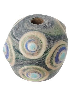 ANCIENT PHOENICIAN RAISED EYES FUSED GLASS BEAD. An ancient Phoenician Raised Eyes fused glass