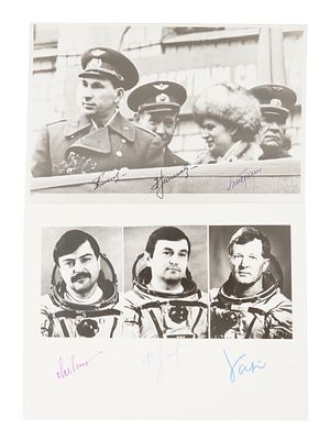 1970S SOVIET COSMONAUTS AUTOGRAPHED PHOTOS. A pair of Russian Soviet era photographs featuring 