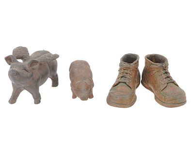CAST IRON PIGS AND COPPER SHOES SCULPTURES. A lot of four cast iron and copper sculptures. 