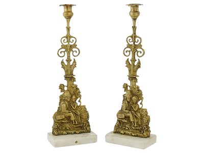 PAIR OF ANTIQUE FRENCH GILT BRONZE CANDLESTICKS. A pair of antique French gilt bronze 