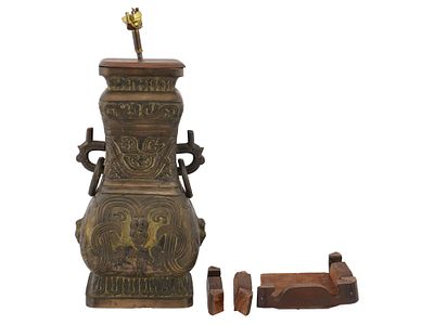 ASIAN MANNER ENGRAVED BRONZE TABLE LAMP W WOOD STAND. An Asian manner gold patinated bronze 