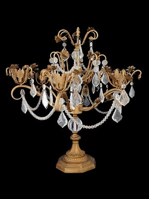 VINTAGE SIX ARMED FLORAL GILT METAL CANDLE HOLDER. A vintage six armed candle holder designed 