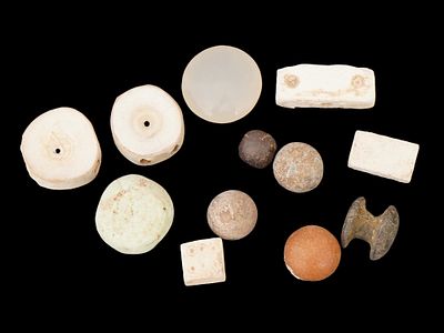 LOT OF ANCIENT ROMAN GAMING PIECES 100 AD AND EARLIER. A collection of ancient Roman carved 