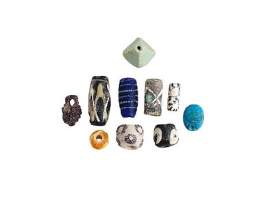 ANCIENT EGYPTIAN MOSAIC AND FAIENCE BEADS 700 TO 100 BC. A group of ancient Egyptian mosaic and 