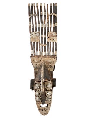 TRADITIONAL AFRICAN TRIBAL ART HAND CARVED WOODEN MASK. A traditional African hand-carved wooden 