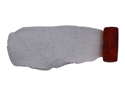 ANCIENT NEAR EASTERN CARVED CARNELIAN CYLINDER SEAL. An ancient Near Eastern cylinder seal 