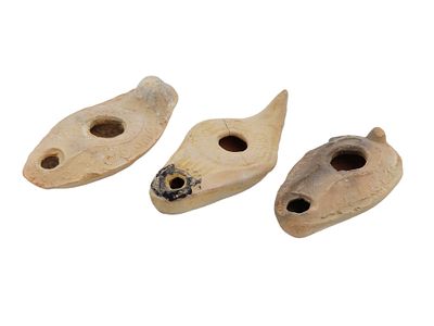 ANCIENT ROMAN EMPIRE UNGLAZED TERRACOTTA OIL LAMPS. A group of 3 Ancient Roman terracotta oil 