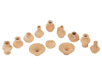 ANCIENT ROMAN TERRACOTTA TOYS CIRCA 100 TO 300 AD. A group of ancient Roman terracotta tableware 