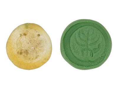 ANCIENT ROMAN EMPIRE GLASS MENORAH MEDALLION. An Ancient Roman glass token or medallion. 
